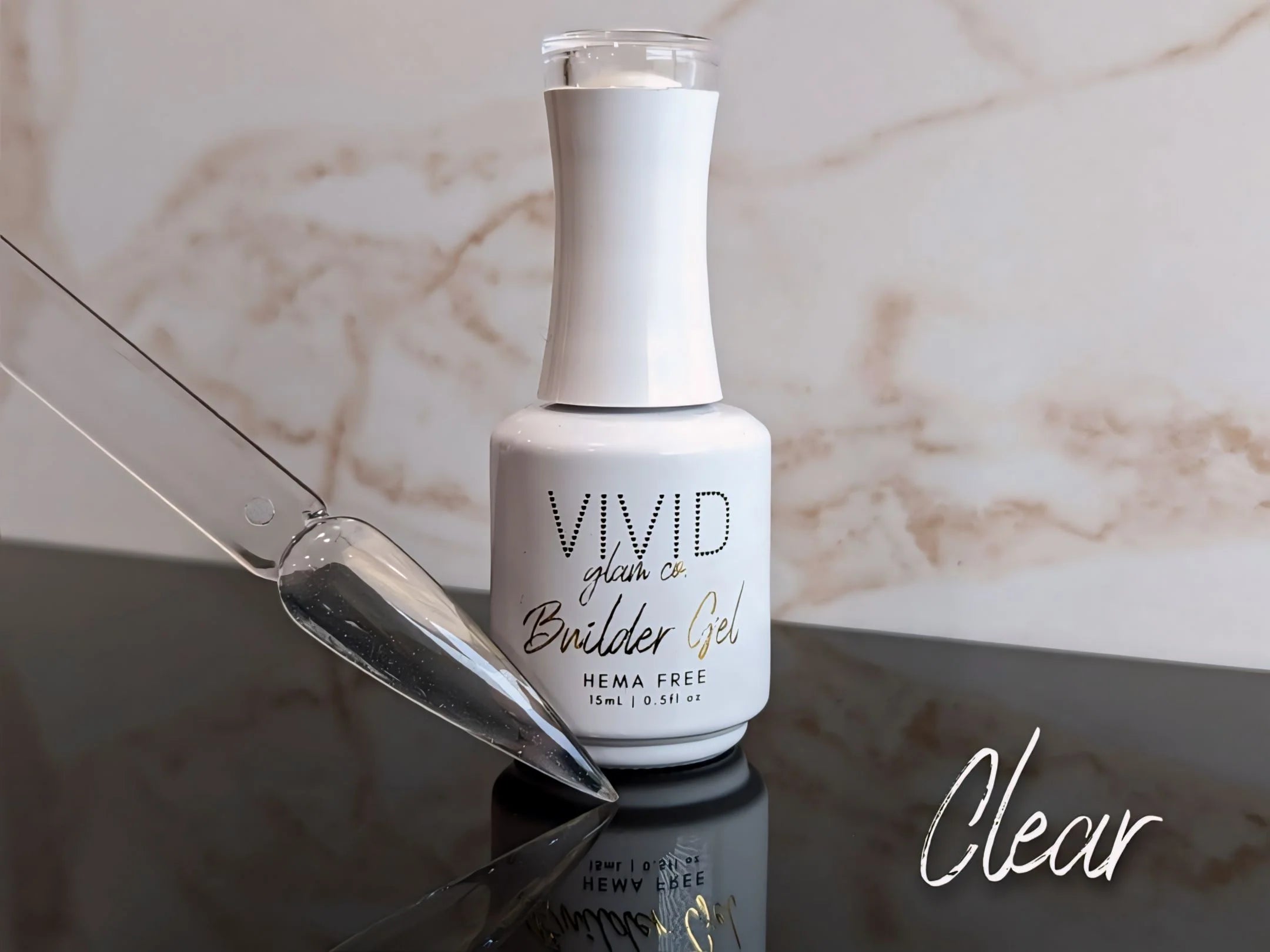 Vivid nail builder gel bottle with a swatch on a marble surface