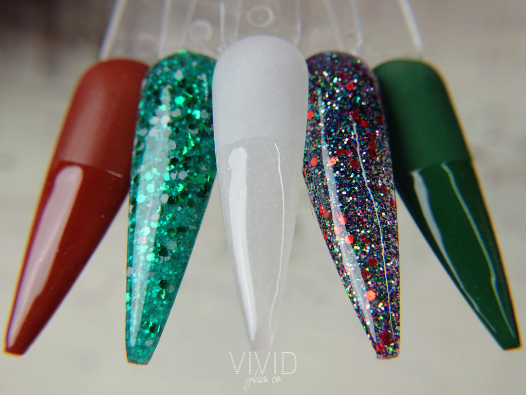 Set of colorful nail adip powder on a clear swatch with 'Vivid' branding.